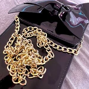 Crossbody Bag with chain strap.
